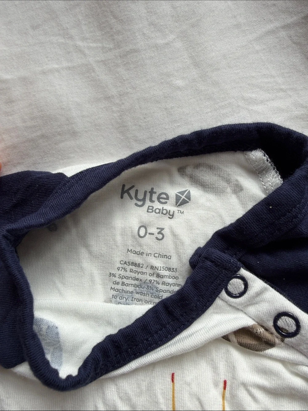 Kyte Navy & White Football-Print Long-Sleeve One-Piece Bodysuit
